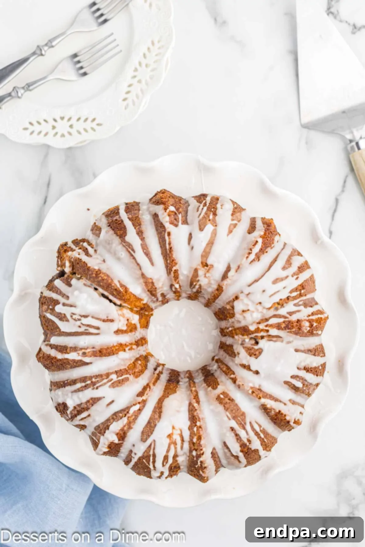 Sock it to Me Bundt Cake on a platter. A full, beautifully glazed bundt cake ready for serving.