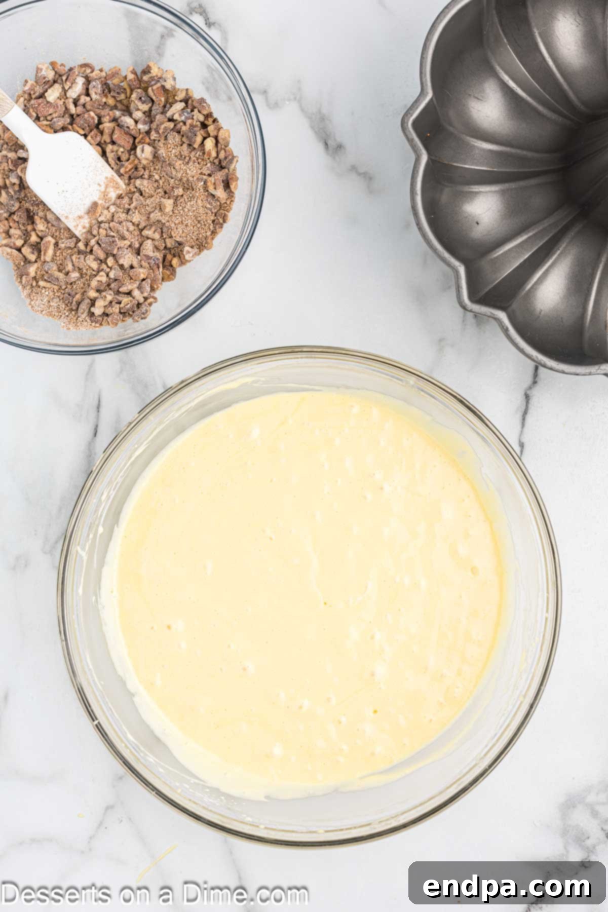 Separate bowl with filling ingredients. Brown sugar, cinnamon, and chopped pecans mixed for the streusel.