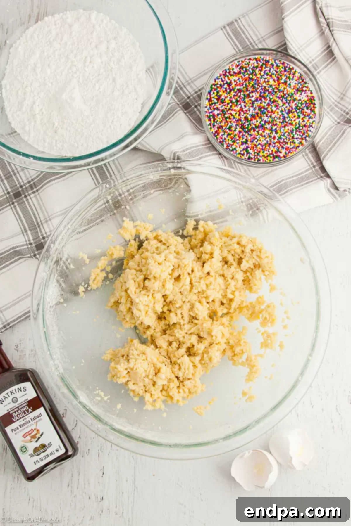 A mixing bowl filled with freshly combined cookie dough, ready for shaping.