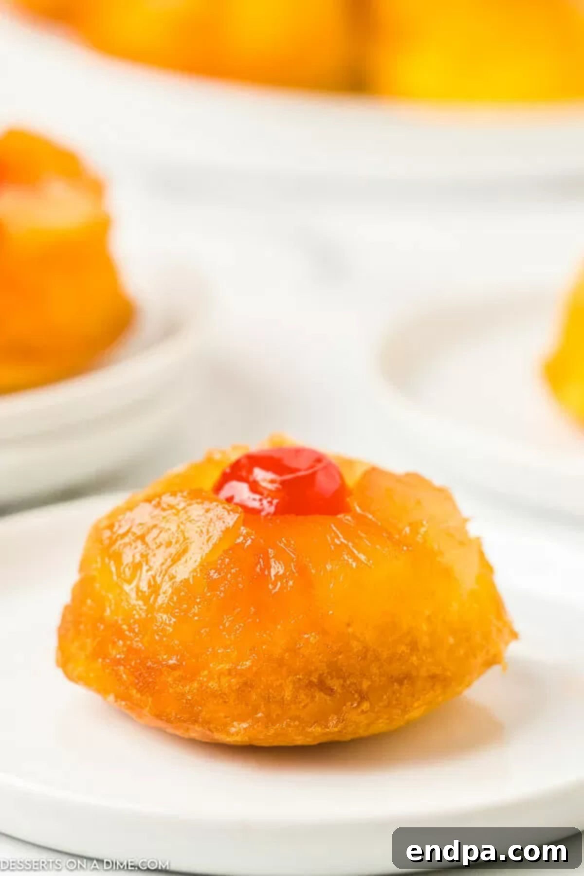 Pineapple Upside Down Cupcakes on a platter