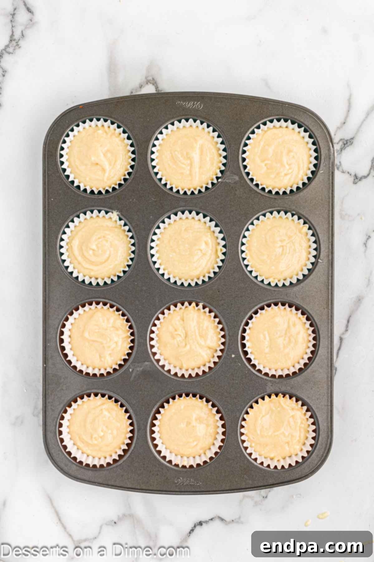 Batter in muffin tins.
