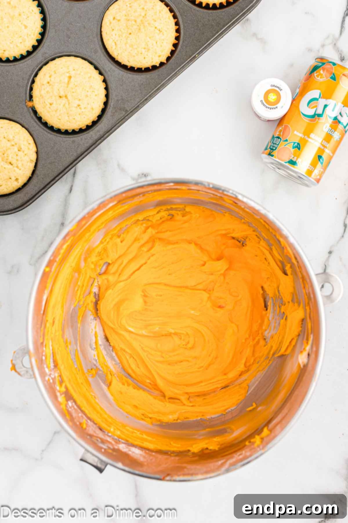 Frosting in mixing bowl.