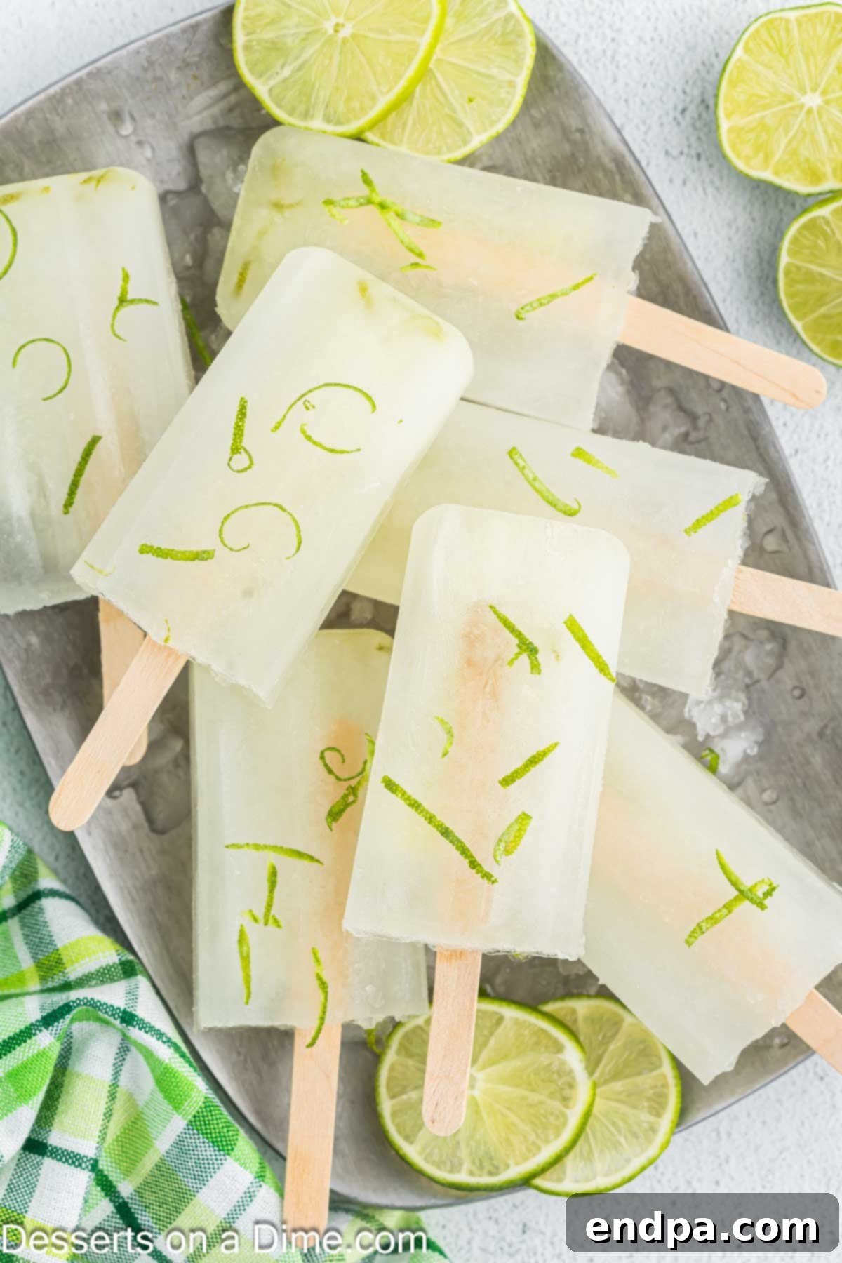Delicious and refreshing homemade lime popsicles ready to be enjoyed on a hot summer day.