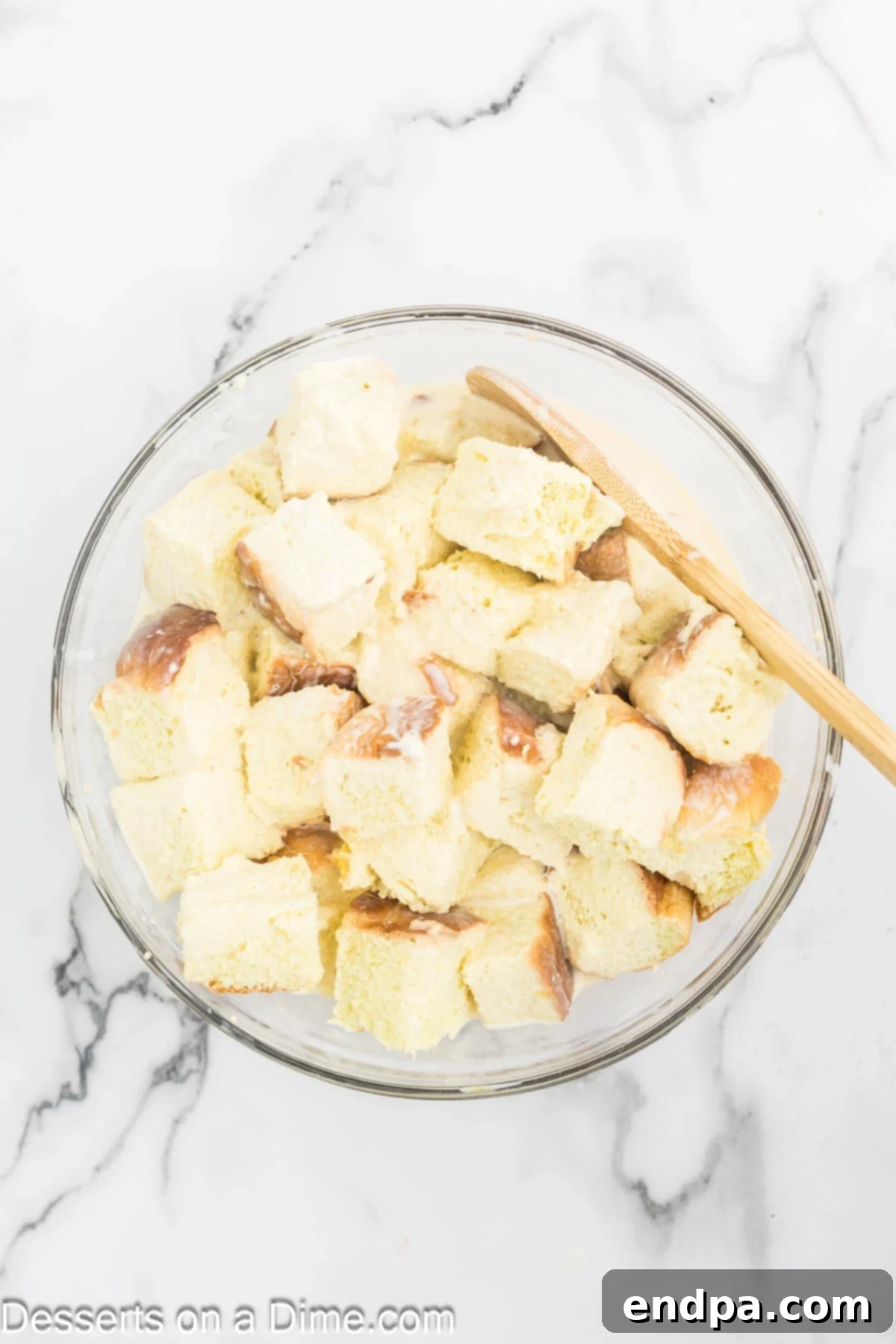 Mixing bowl with bread and custard.