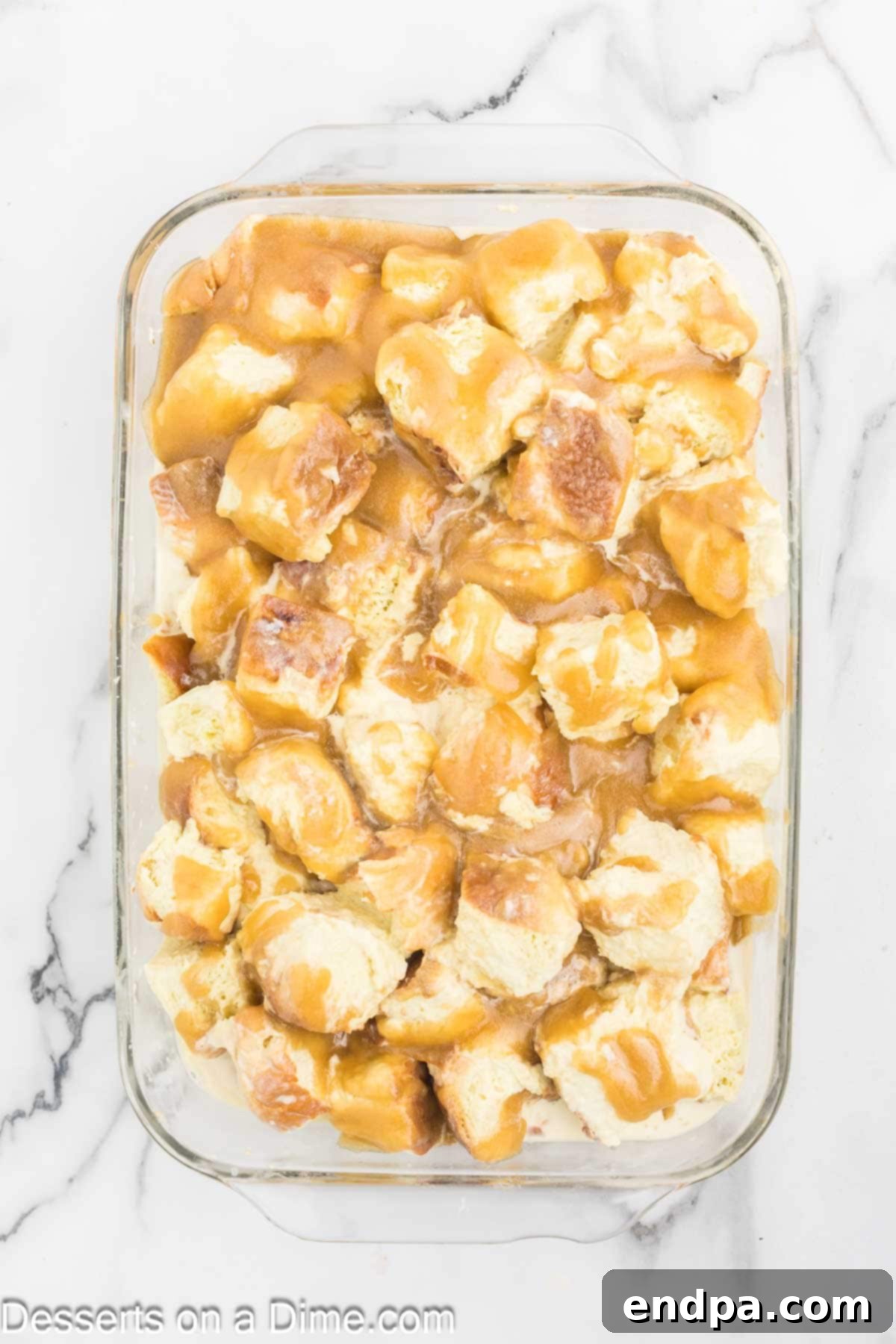 Butter mixture poured over the bread in baking dish.