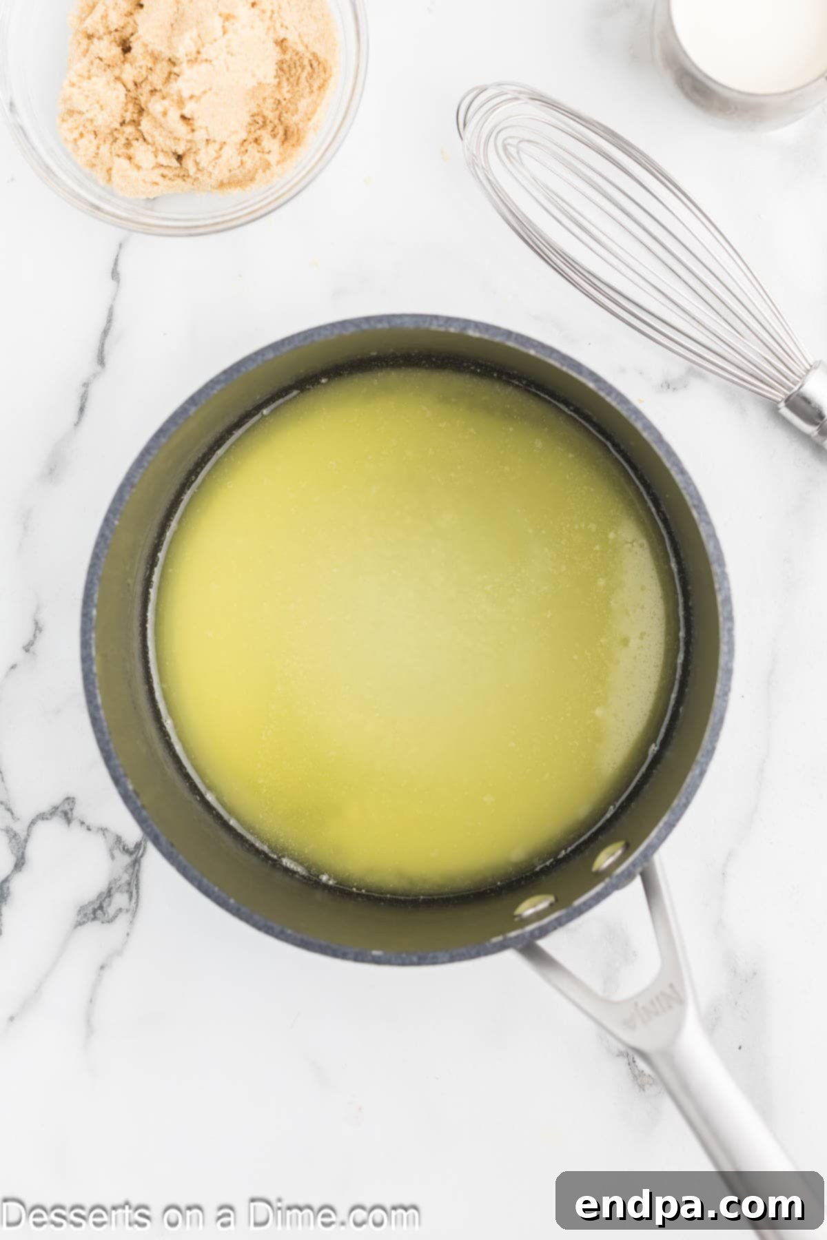 Melted butter in saucepan.