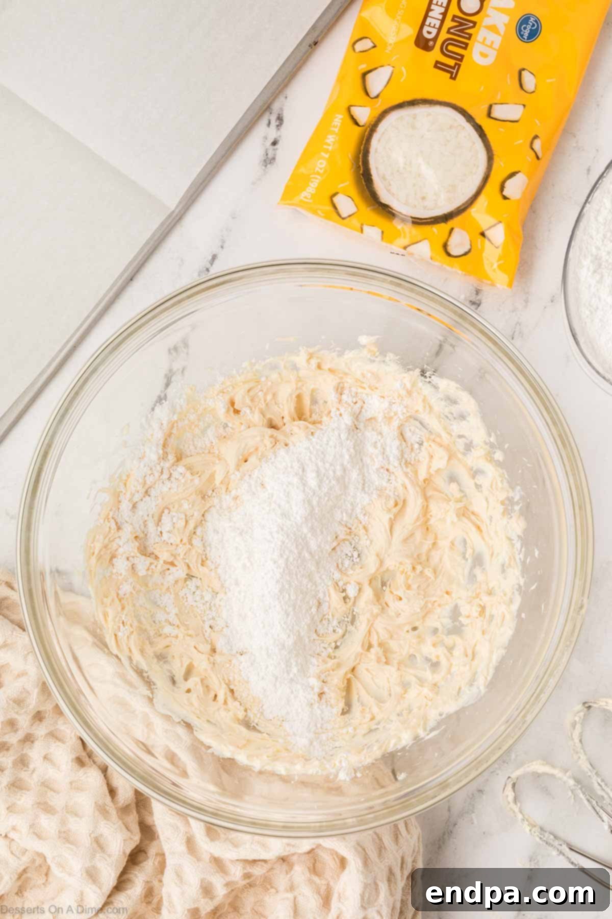 Coconut mixed into bowl