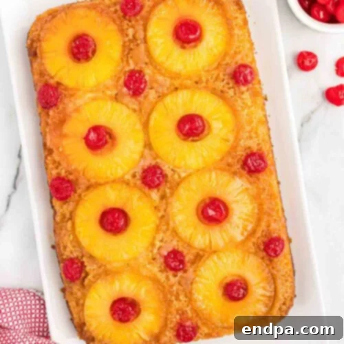Pineapple upside down cake in a baking dish.