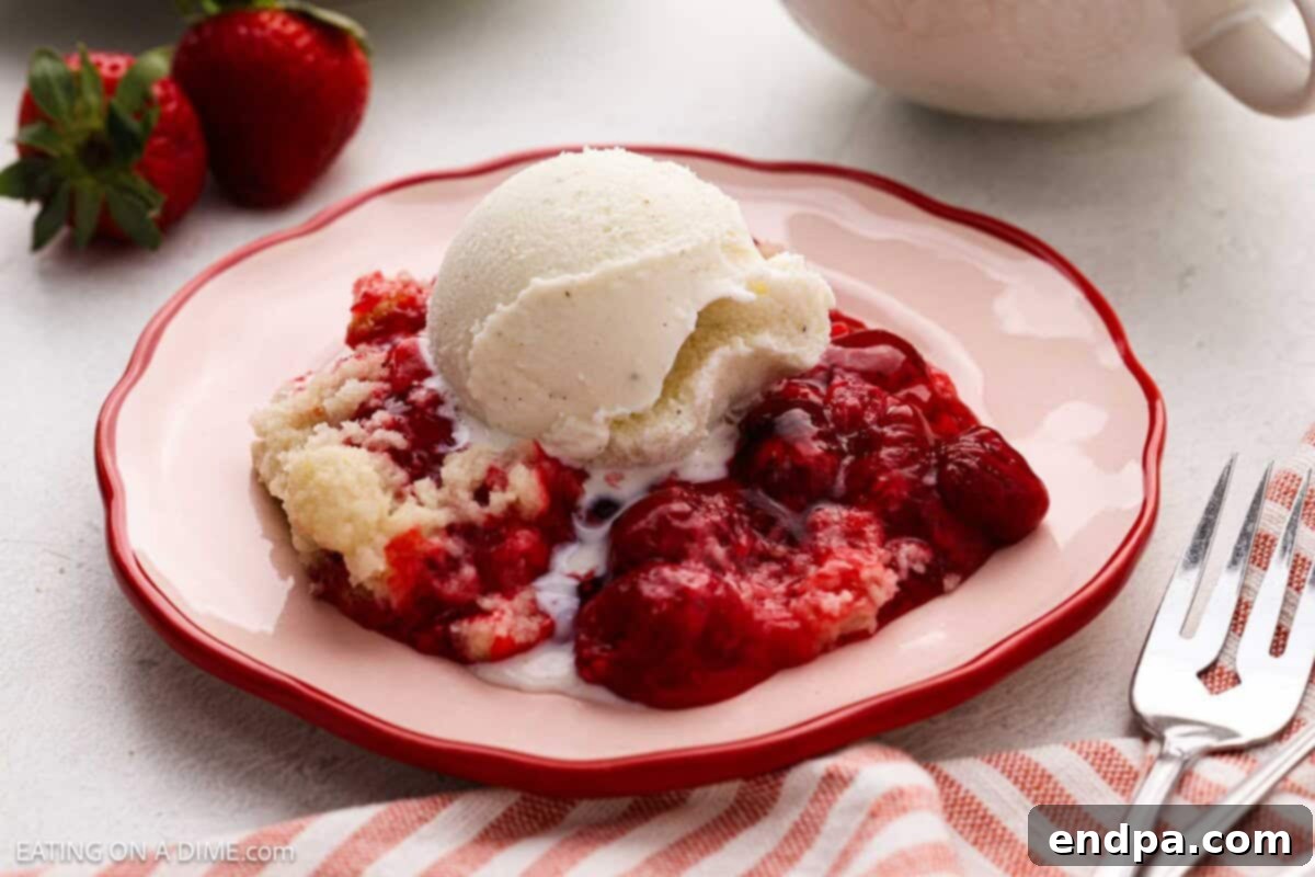 Crock Pot Strawberry Dump Cake topped with ice cream