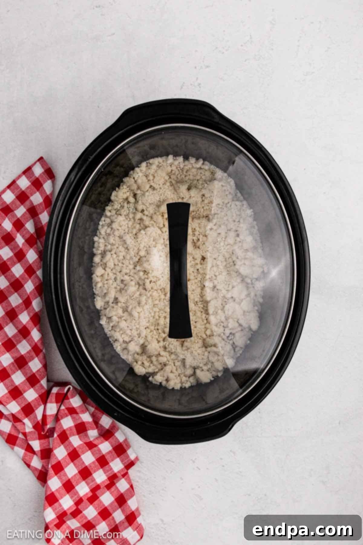 Crock pot with the lid on, ready to cook