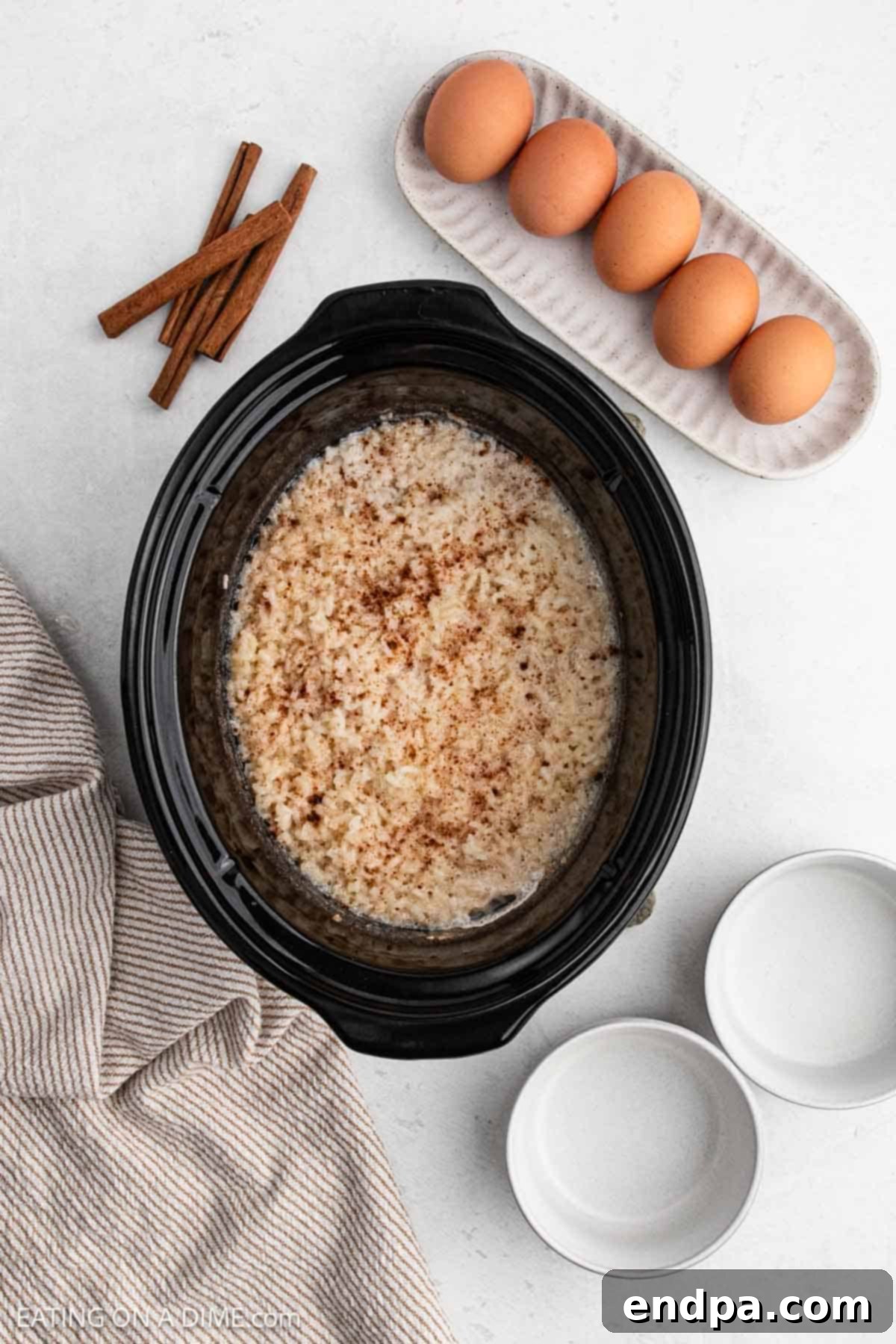 Rice poured into slow cooker.