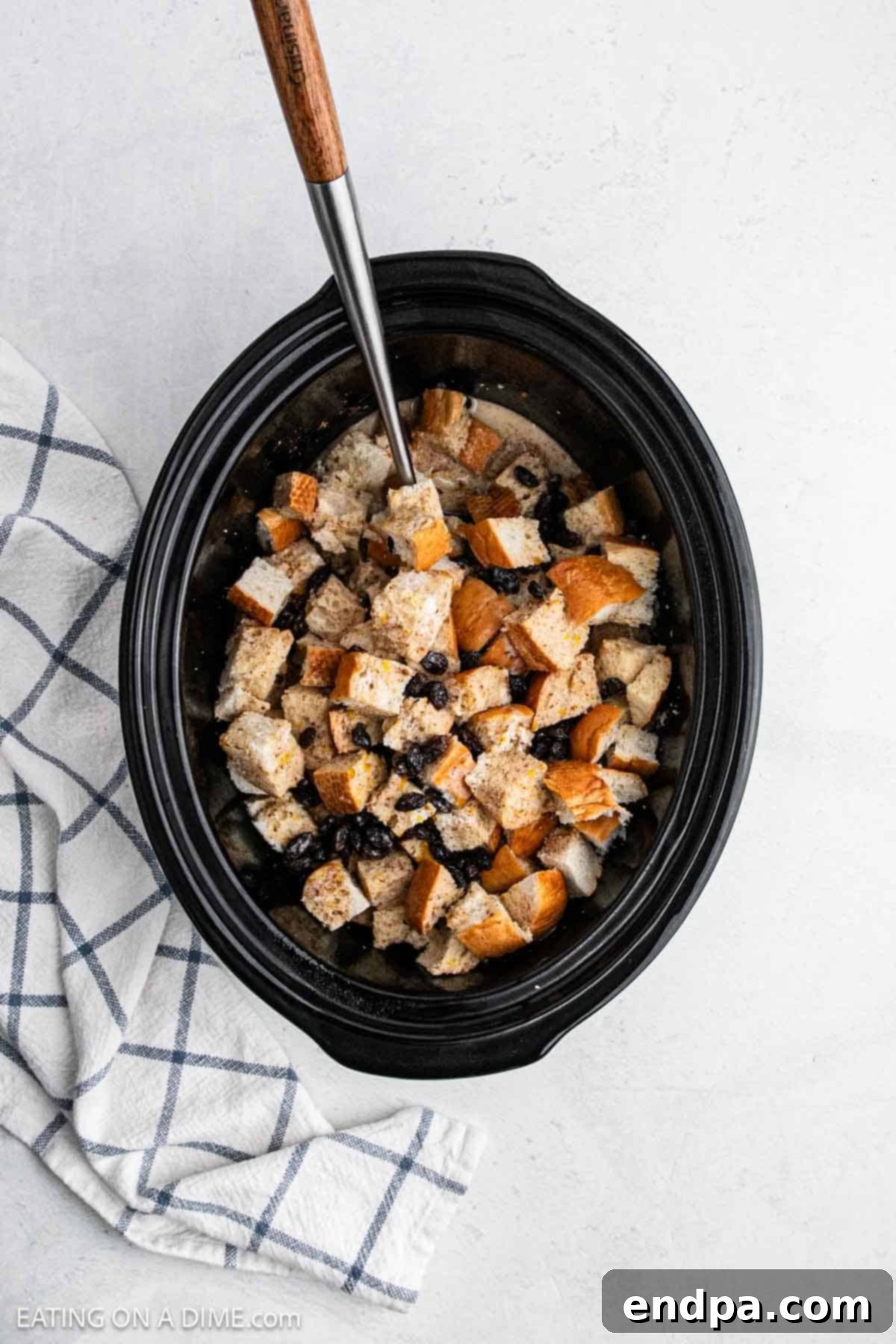 Bread soaked in custard in slow cooker