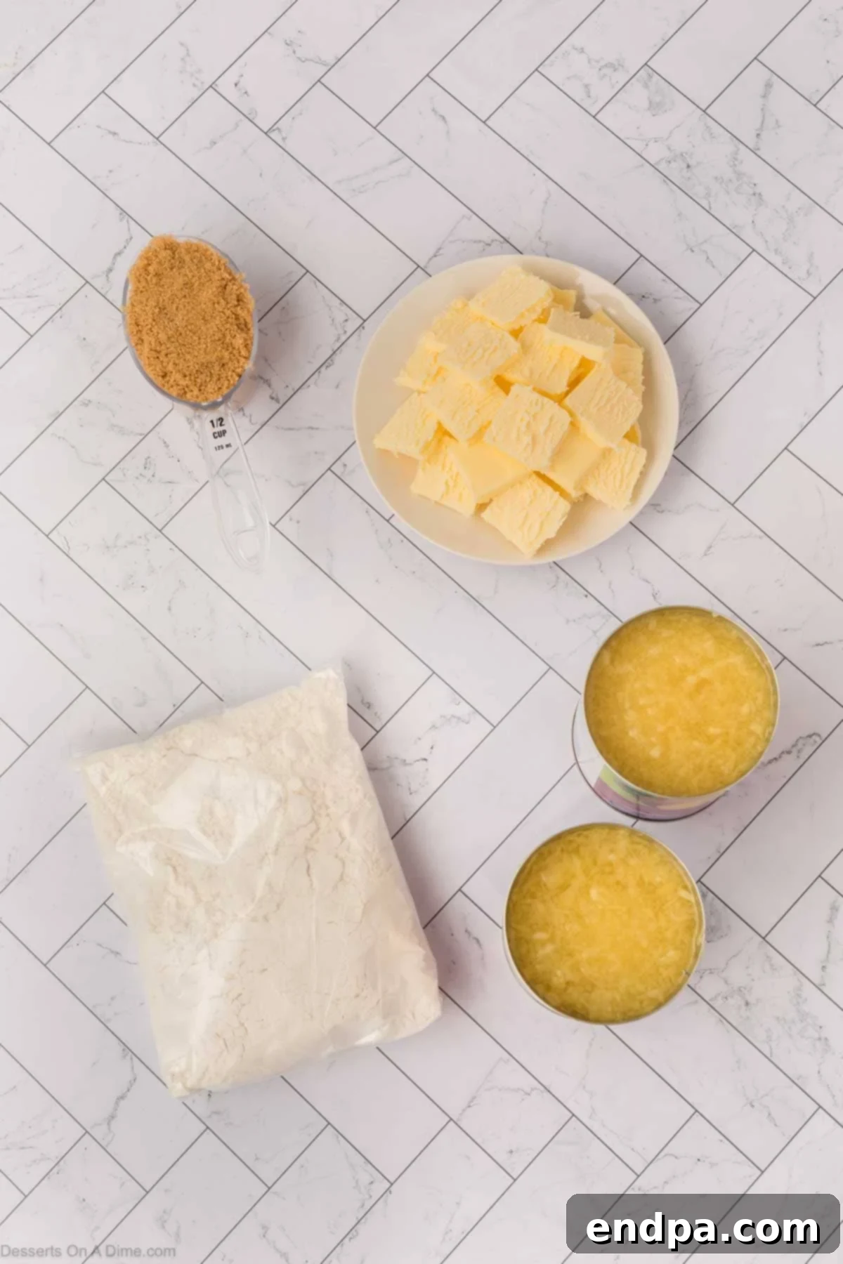 Ingredients for recipe - crushed pineapple, brown sugar, yellow cake mix, butter. 