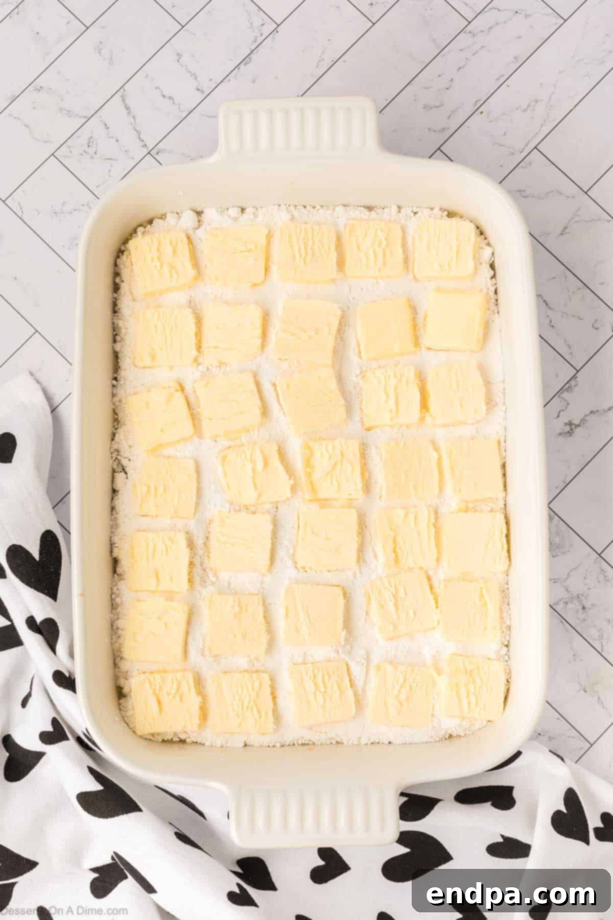 Butter slices arranged on top. 