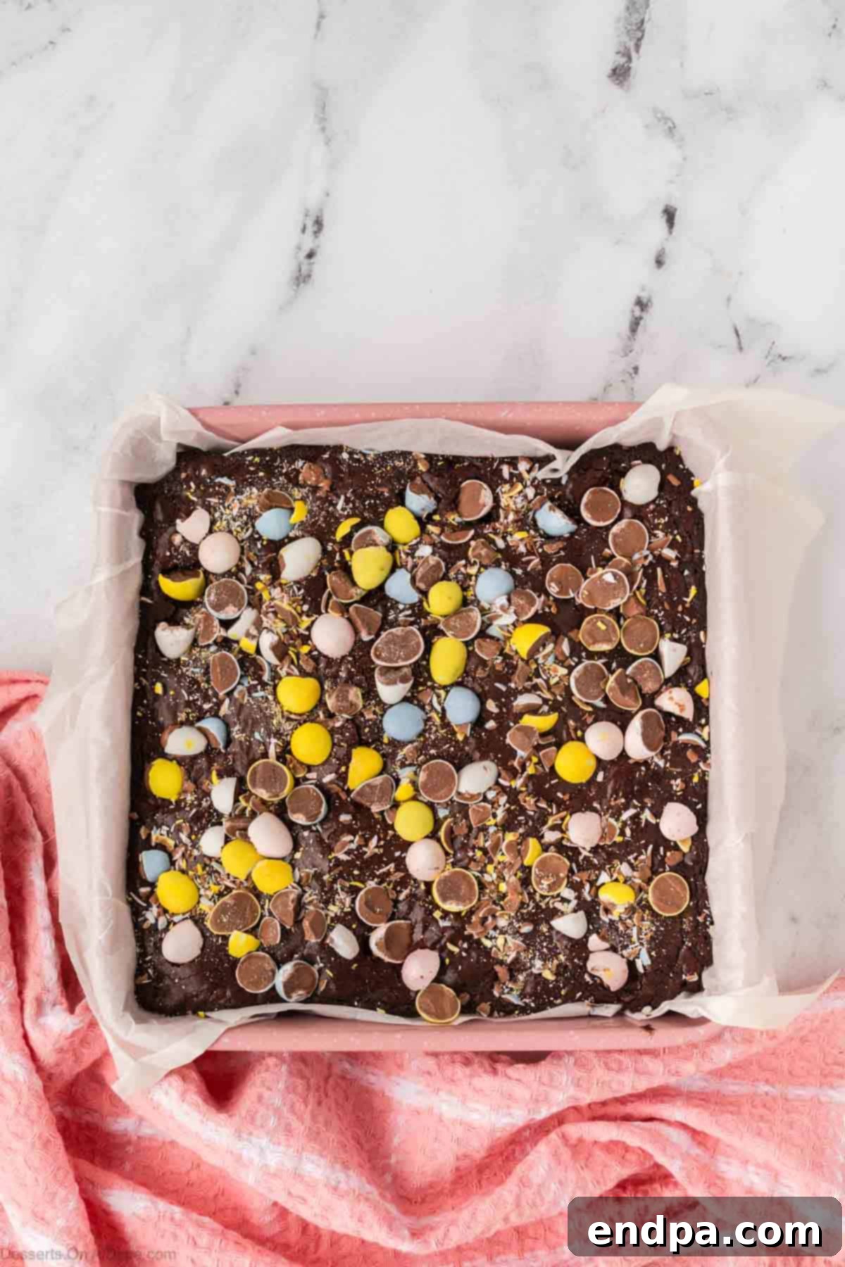Cadbury Egg Brownie Bliss 11 Cadbury Eggs chopped and sprinkled on top of batter