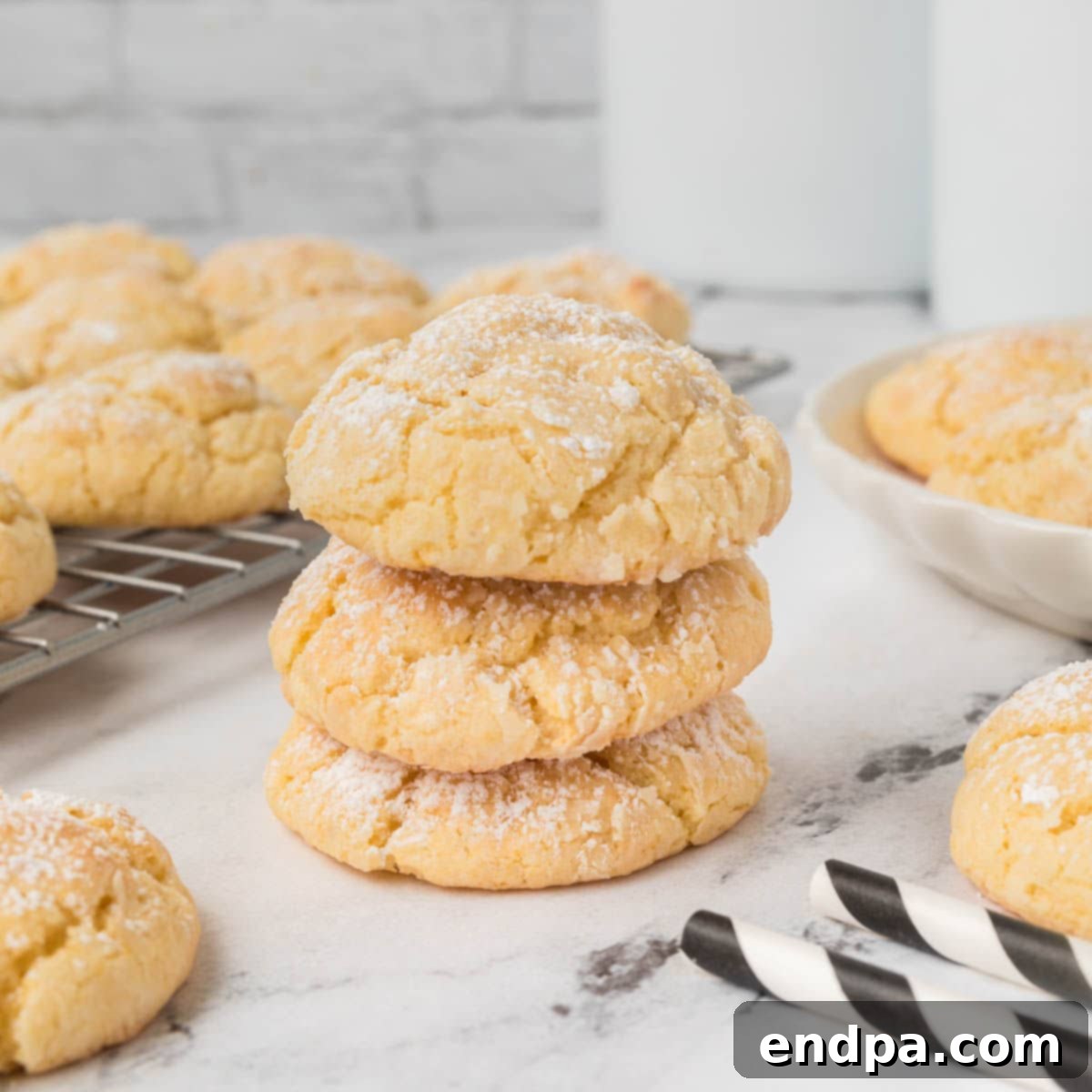 Cake Mix Butter Cookies: Ooey Gooey Goodness 13 Ooey Gooey Cake Mix Cookies stacked together.