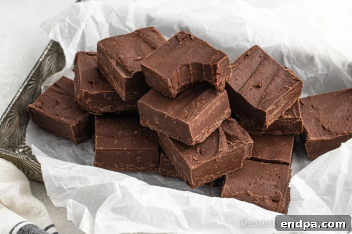 Slow Cooker Chocolate Delights: Crowd-Pleasing Recipes 2 Delicious Crock Pot Fudge cut into perfect squares